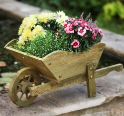Wooden Wheelbarrow Planters 5 Wooden Wheelbarrow Planters -Outdoor Garden Care Shop outdoor wooden wheelbarrow planter garden flowers 1